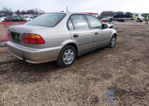 2000 Honda Civic Dx z USA, uszkodzony, nr VIN 1HGEJ6529YL019657